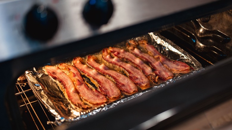 oven-cooked bacon on pan with foil