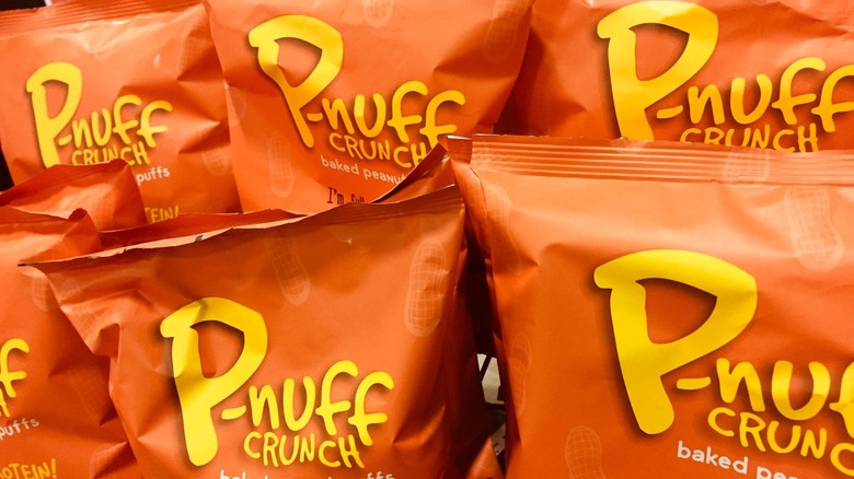 Closeup orange bags of P-nuff Crunch