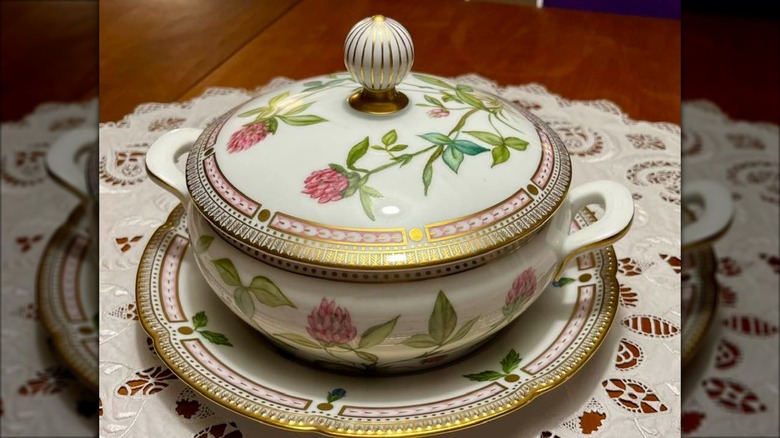 a flora danic serving vessel on white doily