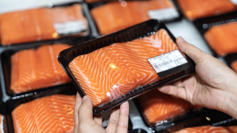 buying salmon at the store