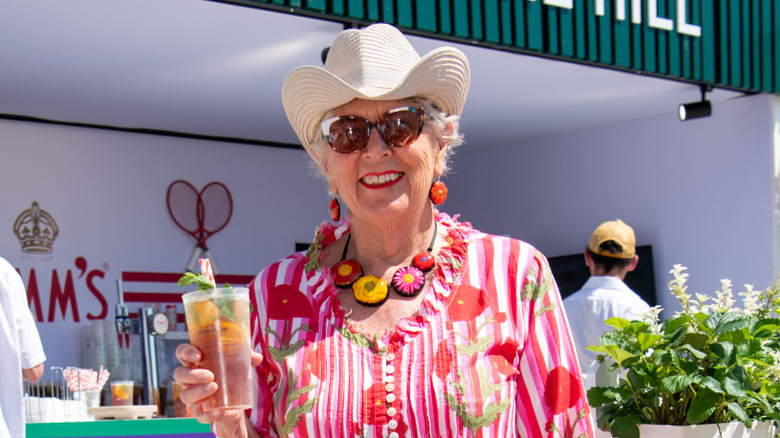 Prue Leith with a drink in 2025