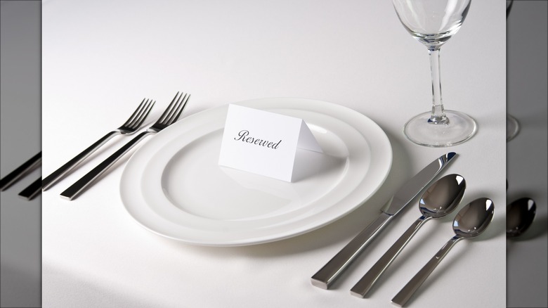 reserved sign on plate