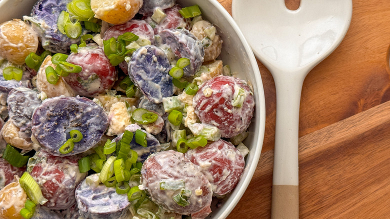 Red, white, and blue potato salad in bowl