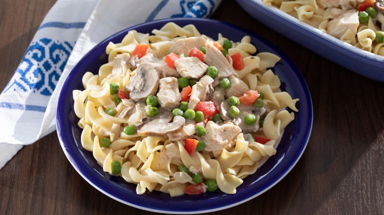 chicken a la king served over noodles