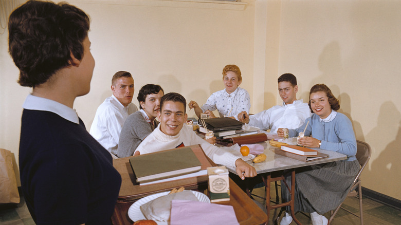 Vintage image of '50s high school students in lunchroom
