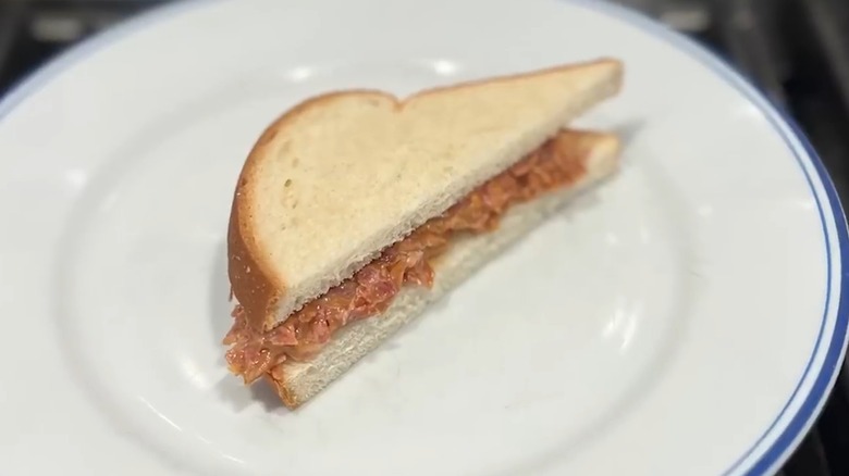 a white bread sandwich of peanut butter and dried beef