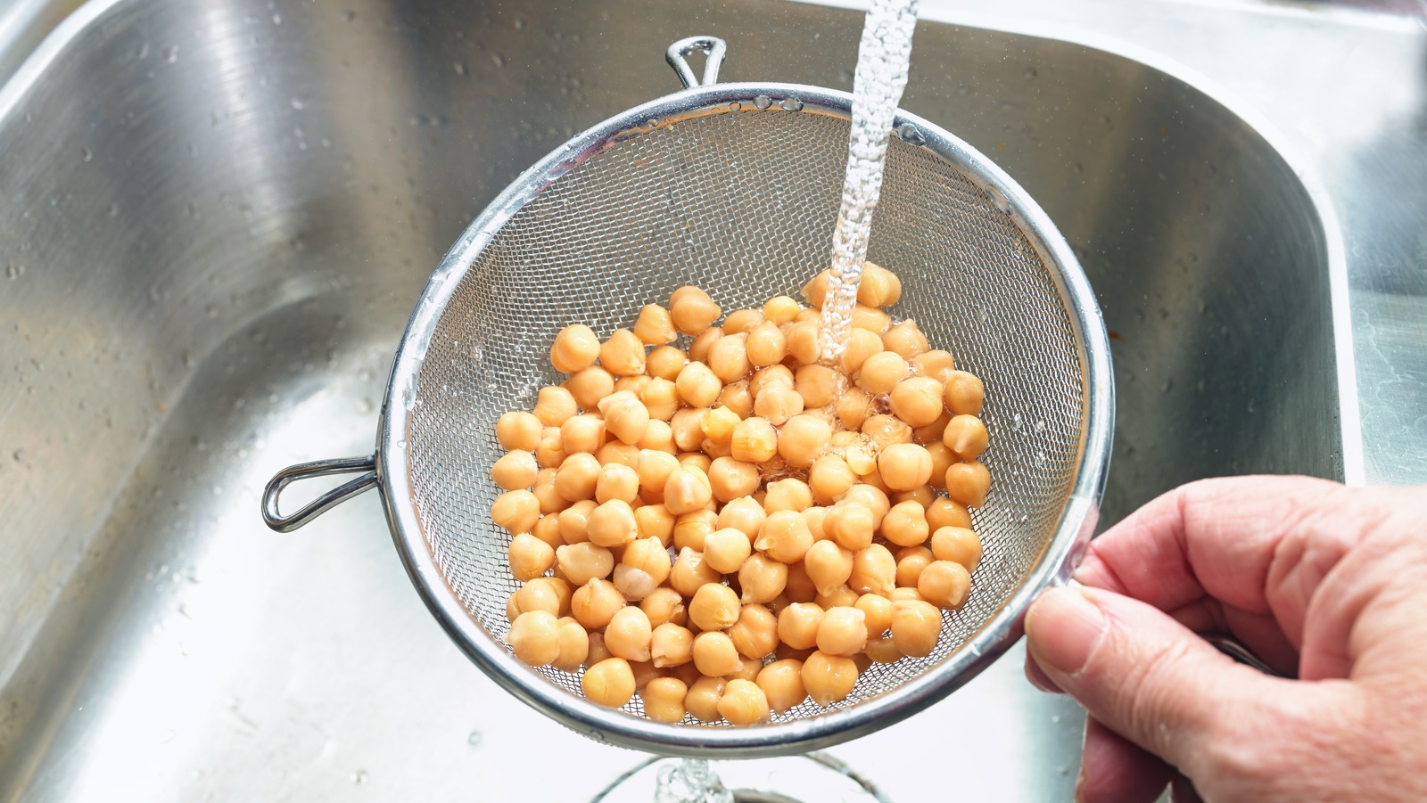 Rinsing Canned Beans Is The Key To Perfecting Your Recipes