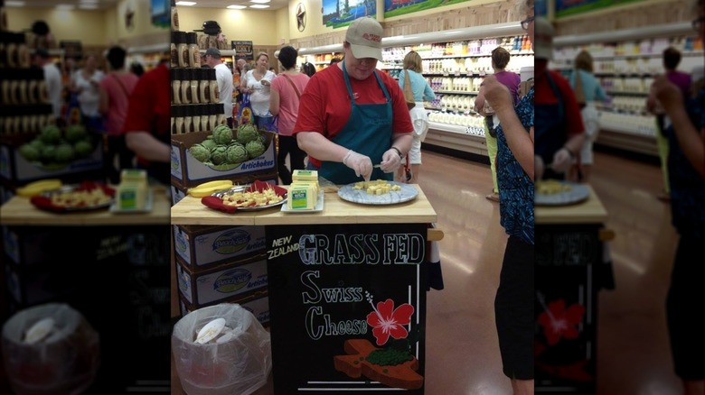 employee offering samples at Trader Joe's