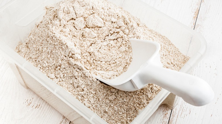 alternative flour in bin with scoop