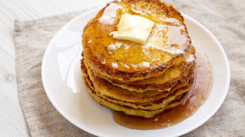 buttered johnnycakes on a stack