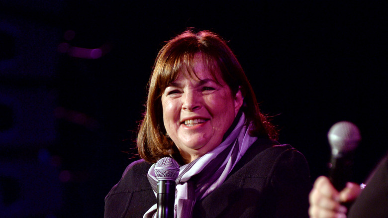Ina Garten speaks onstage with microphone