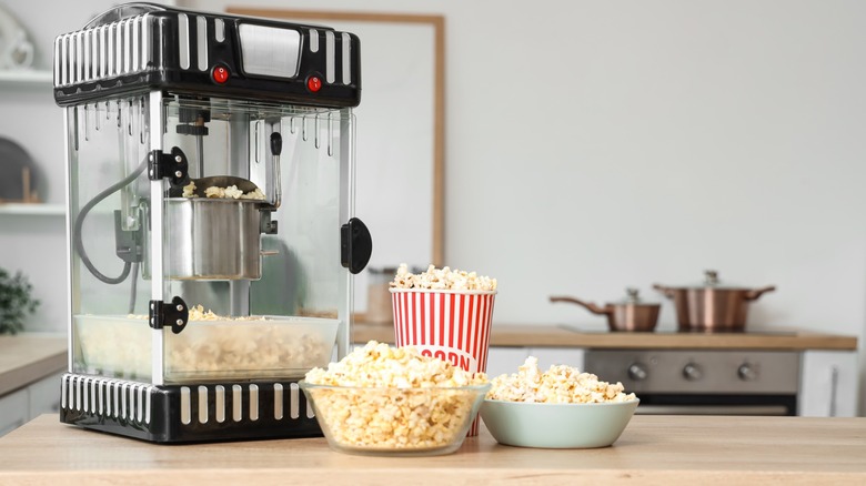 home popcorn machine setup with popped corn