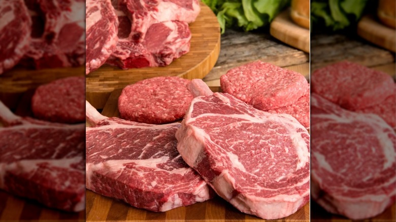 assortment of raw beef products on cutting board