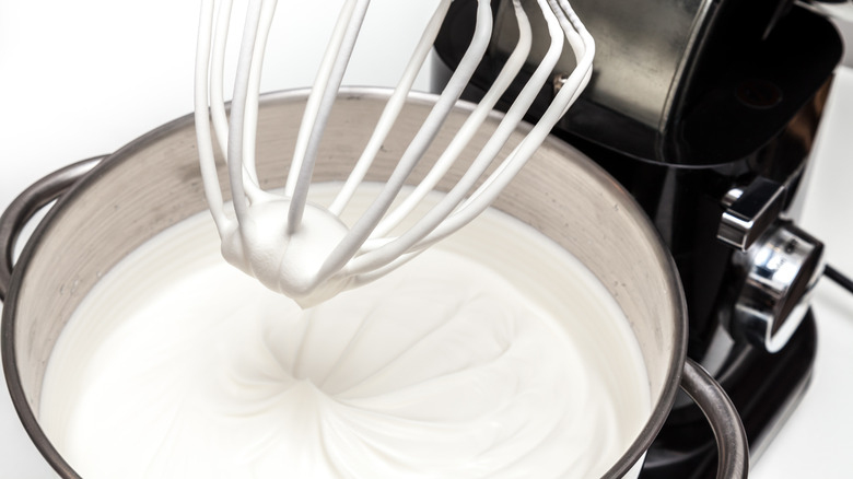 mixer beaters with whipped cream.