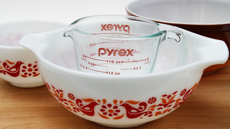 Pyrex measuring cup in a Pyrex dish