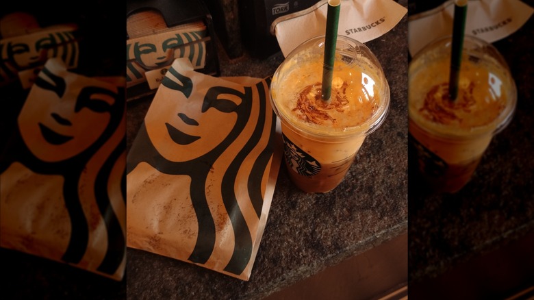 starbucks psl with pastry bag and napkins