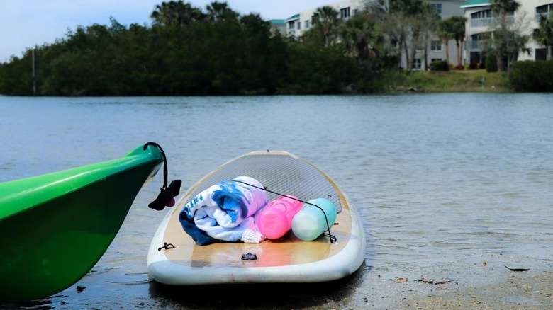 subsafe containers on paddleboard