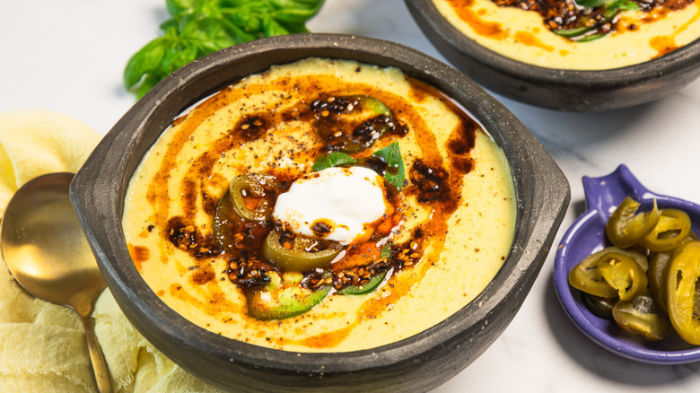 Bowl of corn chowder with jalapeño, crème fraîche, and chili crisp