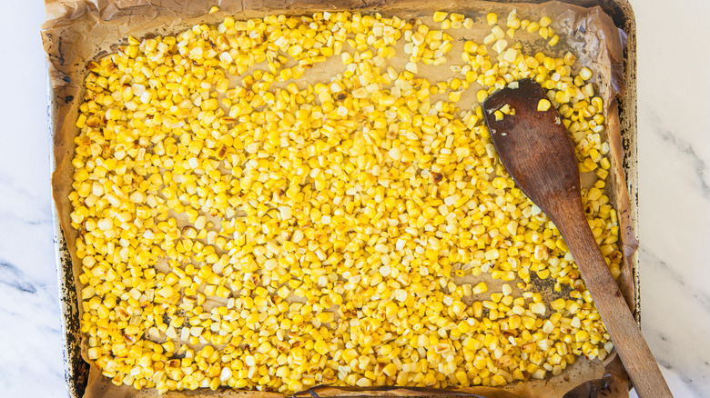 Roasted corn on baking sheet