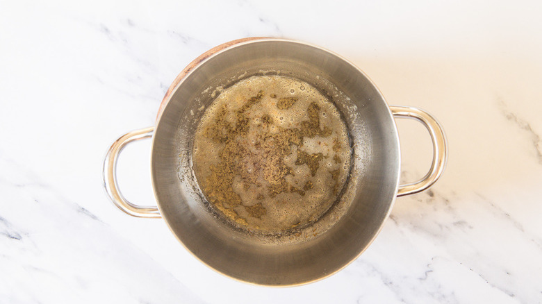 Pot with melted butter