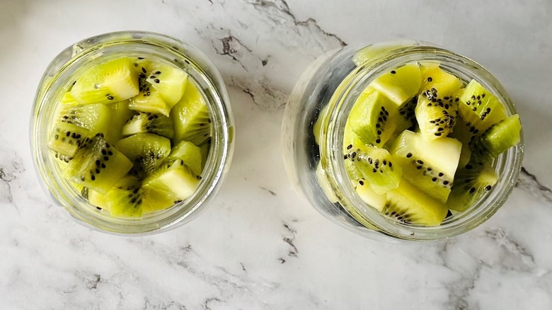 mason jars with overnight oats and fruit topping