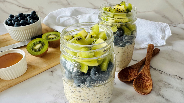overnight oats with fruit in mason jars with ingredients