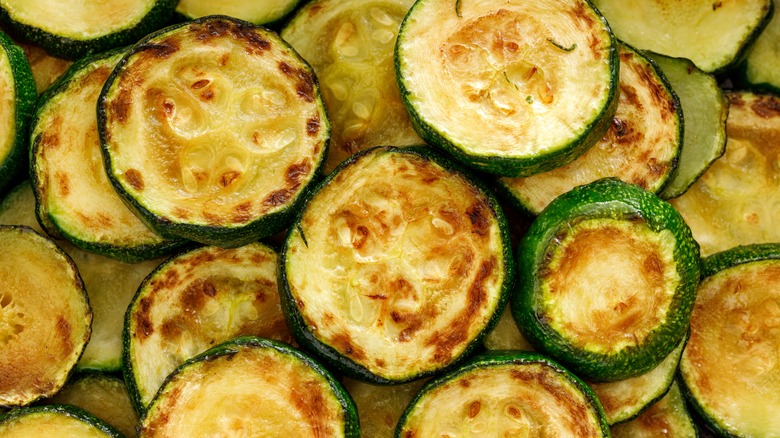 An extreme close-up of cooked zucchini slices