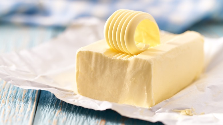 slab of butter with shaved curl on top