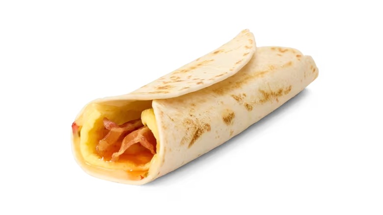 wrap with egg patty, bacon, and hot honey