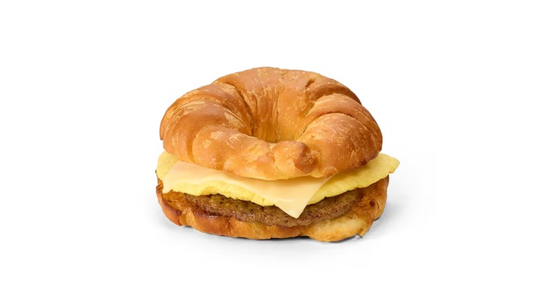 croissant with sausage, cheese, and egg