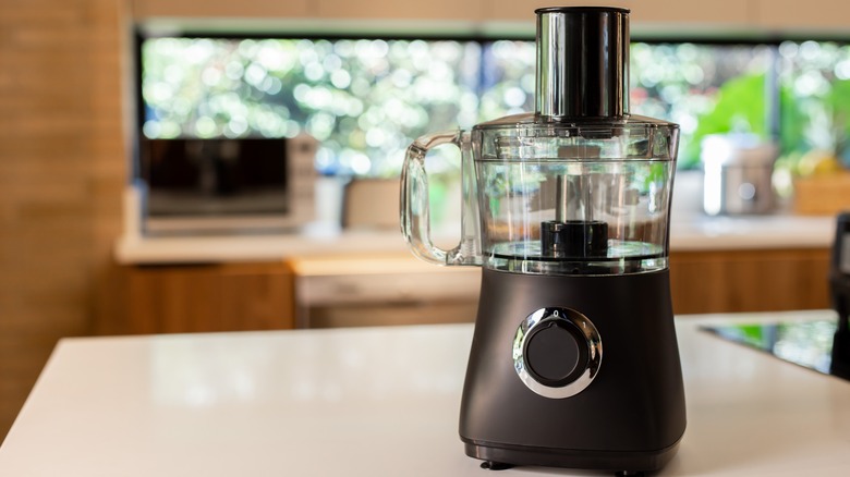 A generic food processor on a kitchen counter