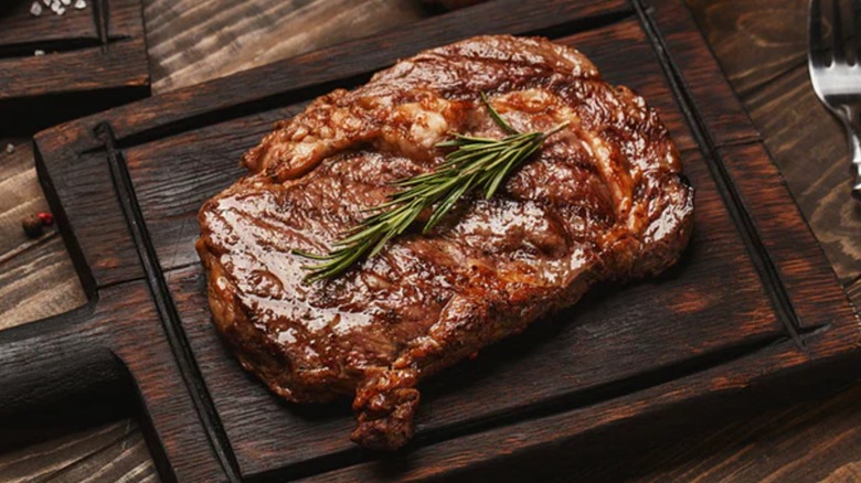 A cooked ribeye steak from Herd 77