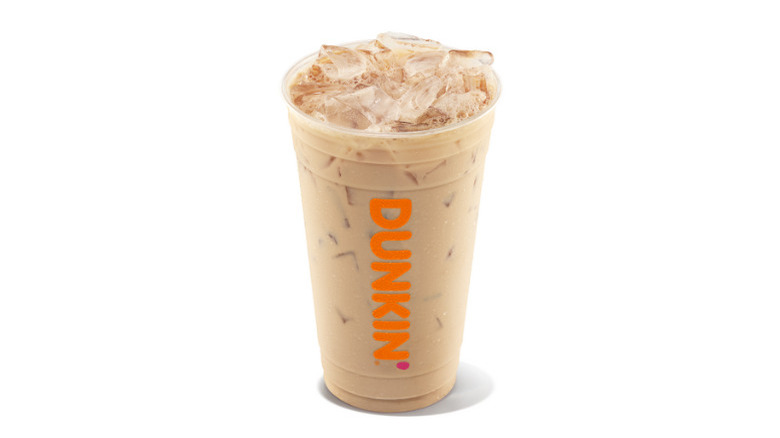Plastic cup of Dunkin' iced chai latte