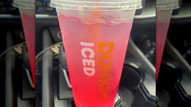 Plastic cup of Dunkin Strawberry Dragonfruit Lemonade Refresher