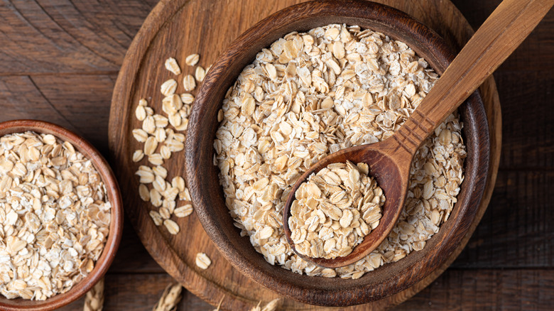 Rolled oats in a wooden bowl