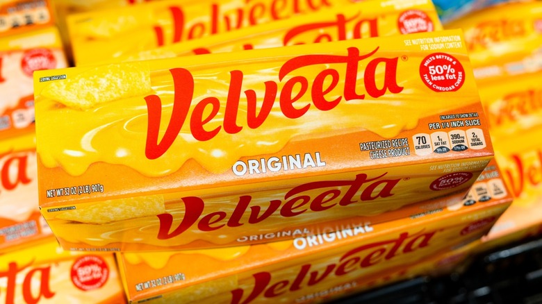 stacks of velveeta bricks at grocery store