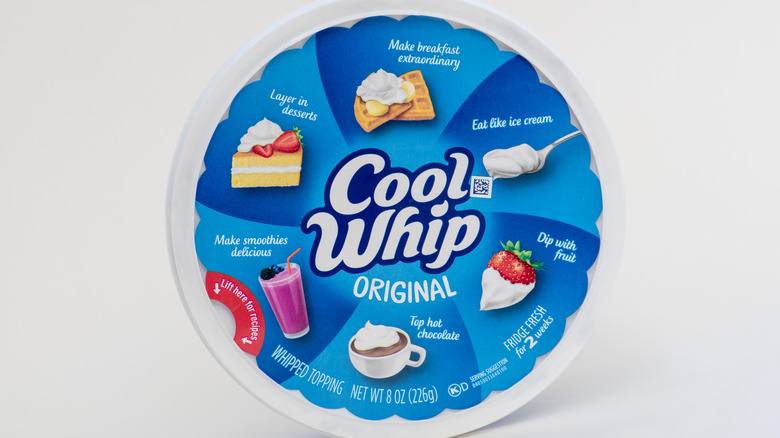Overhead view of Cool Whip container, white background