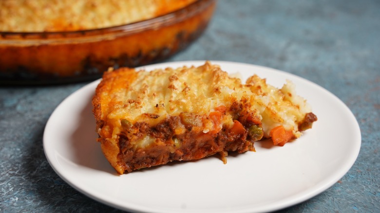 a serving of cottage pie on white dish
