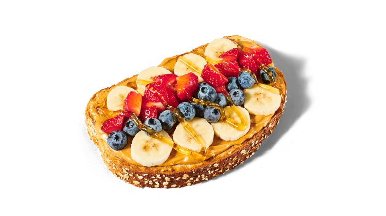 smoothie king loaded peanut butter toast black background