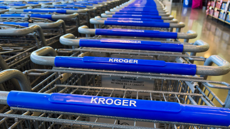 Closeup Kroger-branded shopping carts
