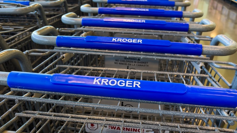 shopping carts with blue kroger handles