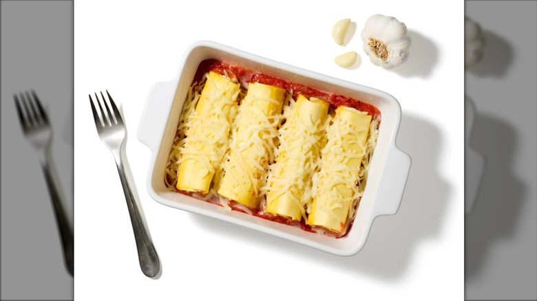 baking pan of cheese manicotti with sauce