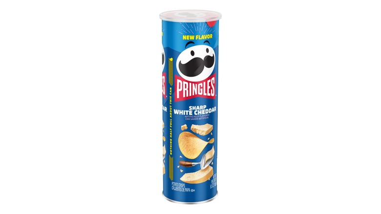 Can of Sharp White Cheddar Pringles on white background.