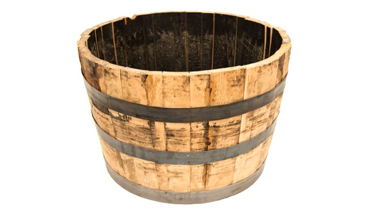 Lowe's Real wood outdoor whiskey barrel