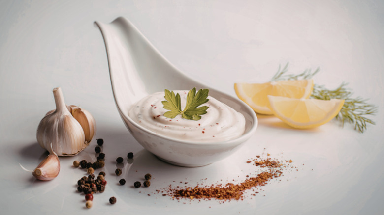 Salmon burger with a lemon wedge