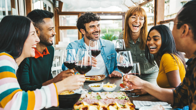 friends having fun at a dinner party