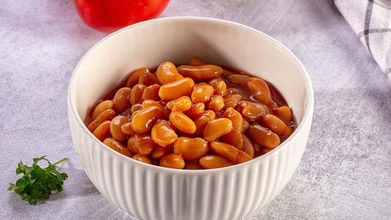 baked beans in ramekin with herbs