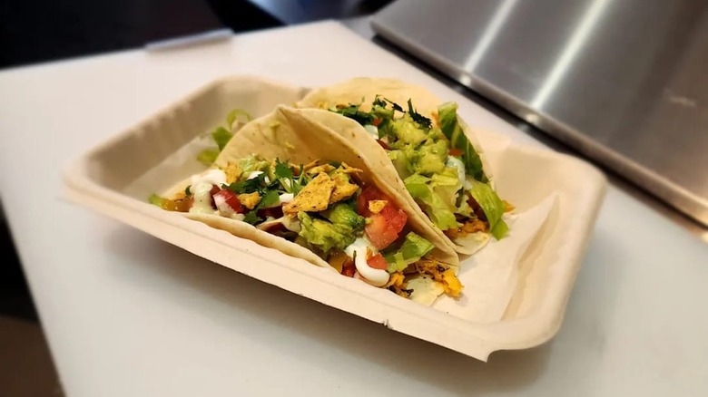 Two tacos from The Bang Shack on prep station