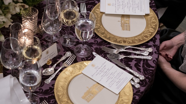 formal place setting with tons of components