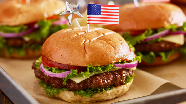 Burgers with tiny US flags in them